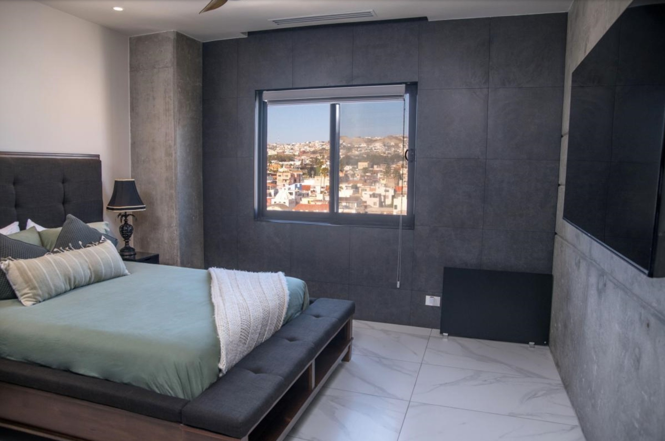 Second bedroom with built-in television