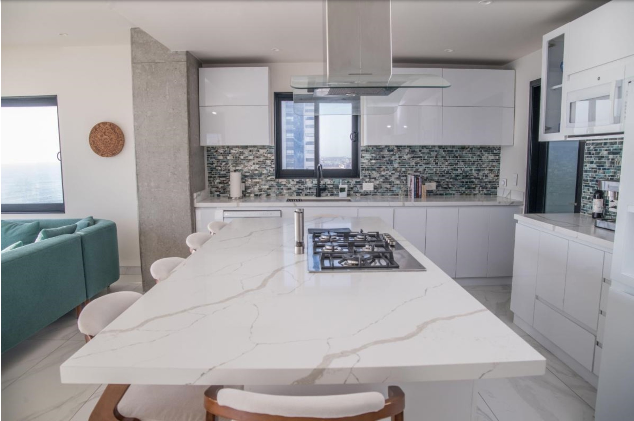 Large white chef's kitchen with island